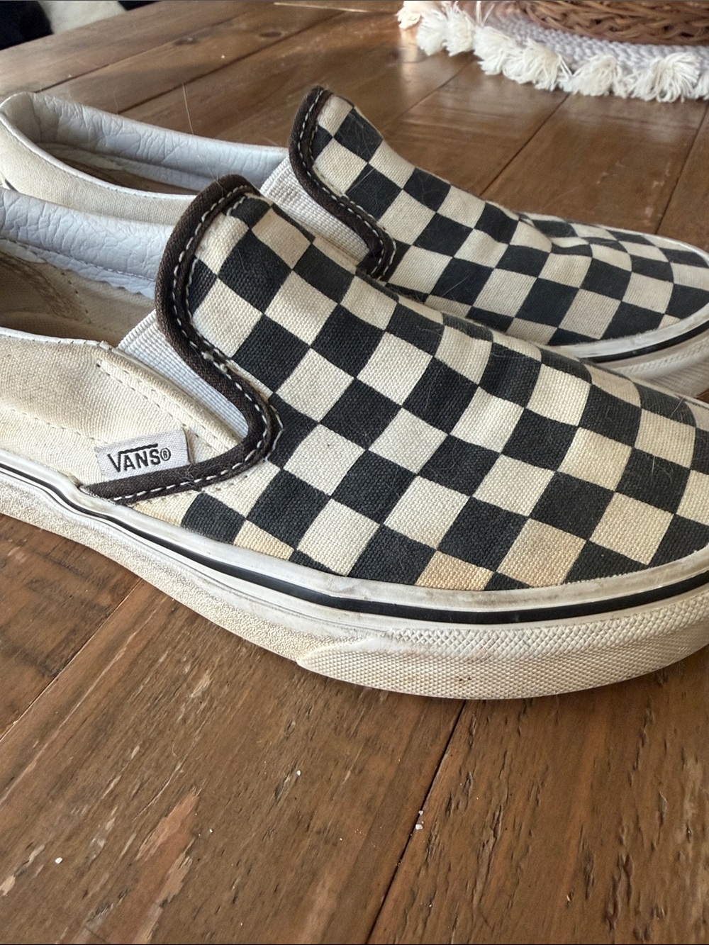 Vans Slip-On Checkerboard Sneakers in Black & Cream